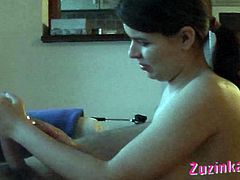 Aroused wanker sits on the couch while a sizzling brunette hussy standsin front of his dick and mouth fucks it intensively in steamy sex clip by Zuzinka.