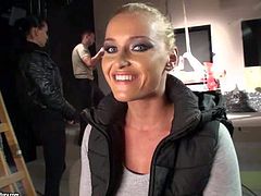 Kathia Nobili is one really beautiful blond-haired pornstar that gives interview behind the scene. Backstage scene shows that she does it with desire for the camera. She is good at it.