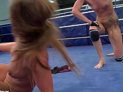 Young blonde slut Angel Long with sexy tattoo and ponytail gets naked during arousing chick with with hot ass brunette babe with big hooters in tight booty shorts in the ring