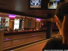 Gorgeous and sexy blonde lesbian babes Wivien and her friend enjoy in teasing the boys with their hot bodies as they play with balls in the bowling room and have fun