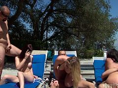 Three tasty looking Russian whore take sunbath by the pool while laying on the deckchairs by the pool. Later two aroused fuckers join them to receive a zealous deepthroat blowjob in steamy group sex clip by Fame Digital.