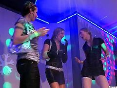 Spoiled Russian milfs in steamy mini skirts get on the scene of a club during a wild corporate party to dance seductively in front of their colleagues.