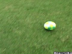 Ardent Latina chick plays football. Horny nympho in yellow bikini wanna relax a bit. All sweaty busty hooker undresses, shows her smooth ass, sweet boobs and wanna seduce a man for casual sex right on the lawn.