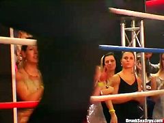 Horny bitches go madly exciting watching brutal dudes fighting on a ring. So when the fight ends they all join these men on a stage going kinky and wild.