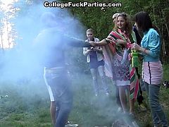 College drunks go out for a party in the woods and turn it into an orgy of sex with lots of sucking and pussy pounding going on in a hot sex party.