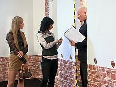Two spoiled hotties are having fun with horny building inspector. They are sucking his throbbing cock through the gloryhole.