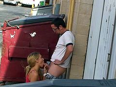 Dirty blonde slut gets filmed by voyeur while sucking one's cock in public