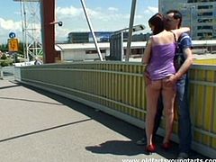 This brunette in short tight dress is fed up with wandering along the streets. Bitchie nympho with droopy ass wanna gain pleasure. She pulls up her dress and gets her pussy rubbed by a stranger. Pale hooker kneels down and repays with a solid blowjob for sperm right on the bridge.