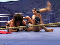 Larissa Dee, Diana Stewart and Emma Butt make a pretty hot threesome in the gym in wrestling ring and even hotter one after that under the showers with some sex toys