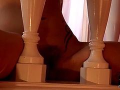 Obedient hussy gets her legs and hands tied to the banisters with her asshole and pussy plugged with dildos in sizzling hot sex video by DDF Network.