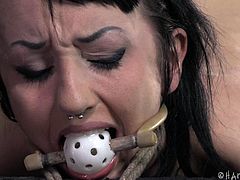 Naughty Bunny thought things can go her way so she ended up at Hard Tied. This cunt is now receiving the discipline she needs. She stays bent over tied up hard and ball gagged as the executor spanks her ass so hard that she almost cries. After he spanked it with a stick he grabs a paddle and hits that butt harder