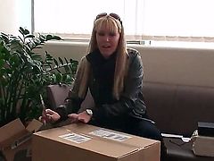 Blonde pornstar Sophie Moone opens her present