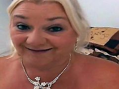 Long haired full figured mature blonde whore Linda with unreal gigantic gazongas and pierced nipples gets naked while teasing tall handsome Jay and sucks his cock with great lust.