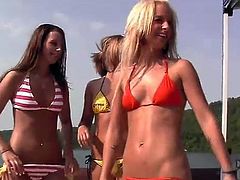 Four chicks in bikinis model on the boat