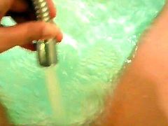 Petite blondie having masturbation in bath