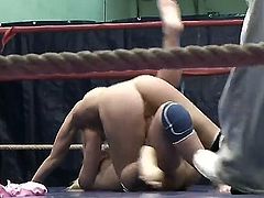 Pretty young slender blonde hotties Nataly Von and Nikky Thorne with tight asses and natural boobies get naked during arousing chick fight in the ring while referee films them.
