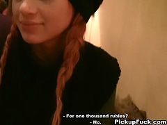 She is naughty girl with red color hair. She has fun with two guys she met lately. So they go in the public toilet where she sucks their dicks in a row.