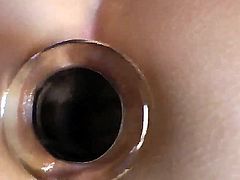 Pretty brunette sticks a dildo and uses a purple vibrator in her pink flawless pussy to masturbate