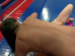Stunning babes Ionella and Lioness enjoy in hot lesbian wrestling with taking of the clothes in the process and have fun in their match in the ring on the floor