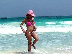 Karla Carrillo in pink at the beach