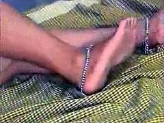 Dark skinned Desi mommy takes off her sari and strokes her wet hairy pussy. Her hubby comes in and joyfully licks her bearded clam.
