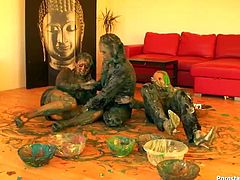 This kinky cat fight scene in fucked up for sure. Three smoking hot Euro chicks get wild with paints. Bitches struggle right on the floor all covered with brown and green paint.
