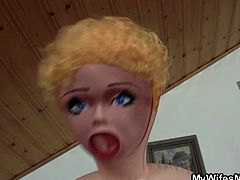 Blonde mother-in-law catches her son-in-law making love to a doll as he face fucks it and fucks it. She comes in and takes over to give him head and let him pound her shaved cunt.