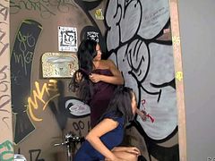 Black haired turned on sluts Jewels Jade and Danica Dillon with big firm tits and smoking hot bodies share stiff cock in provocative threesome with tattooed dude in public toilet