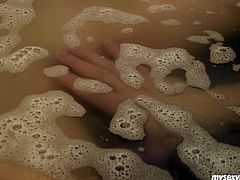 Dirty-minded zealous and too voracious brunette is in the bathroom. She takes hot soapy bath with her BF. Pale harlot with natural tits spreads legs wide and spoiled dude starts licking her wet pussy with delight right in the water.