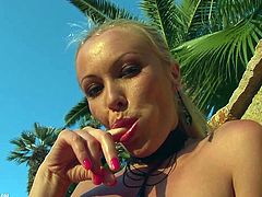A gorgeous blonde babe solo model gets naked outdoors and masturbates her gorgeous pink pussy till she gets an orgasm. Check it out!