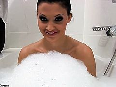Aletta Ocean with gigantic hooters bares it all in a tempting manner