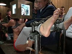 Cassandra Nix is a cute teen, that's being cruelly humiliated by a group of men. Her legs are spread and put in stirrups. One of the strangers takes a cattle prod and uses it on her feet and tits. She gets the prod pressed against her pussy, at the same time vibrator is used on her cunt.