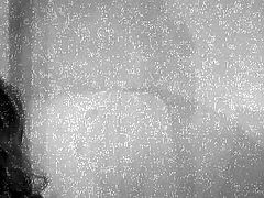 This horny couple is having sex and it's filmed in black and white as they go to it. He takes her clothes off and fondles before he starts licking pussy. Then she gives some head before he starts pounding her cock box.