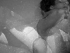 This horny couple is having sex and it's filmed in black and white as they go to it. He takes her clothes off and fondles before he starts licking pussy. Then she gives some head before he starts pounding her cock box.