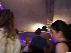 A lot of busty and booty chicks are dancing and getting fucked right on the dance floor. They enjoy each other bodies and juicy pussies in public.