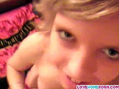 This young blonde babe takes her clothes off, gets on her knees and starts sucking her boyfriend's cock.