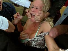 Simone is a pretty blonde that needs to learn a few things about men! First of all she should never trust strangers. Second, Simone should open her mouth wide when she's asked to. Here she is blindfolded and roughly fucked by these guys until they've had enough of her pussy. Next they go for her mouth