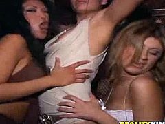 Two wild chicks dance and get their tits licked right in the club. After that they suck cocks and get pounded in the house.