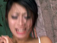 Nana Kunimi gets gangbanged with her hands tied up. She is made to suck cock and the penis is shoved deep inside her mouth. She rides one cock while she sucks another, then gets fuck from behind very hard.