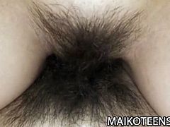 Japanese teen babe Masako Kosaka moans in joy as sex toys pleasure her hairy pussy. But she gets even hornier when she tastes that hard cock and gets her hairy pussy drilled.