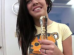 Hot and young brunette Colby Mc Adams is sucking huge dildo at front of her fucker and excites him and gets his dick in her mouth instead of dildo.