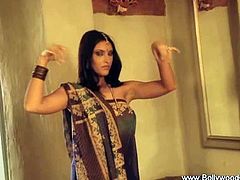 Check out this sexy Indian girl showing off her hot body. She is dancing around and her big natural titties are ready to show up!
