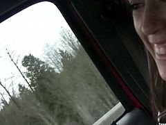 Naughty and playful brunette starts to touch and stimulates his cock in pants. She is eager to give him blowjob while he drives a car.