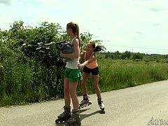 This cute blonde and her dirty brunette gf are having a good time roller skating down the road. They get horny and decide to stop so they can make out and fuck. They find a nice secluded place and get naked. Dirty girls!