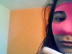 Latina in a pink face mask