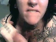 Lucky guy to get his big fat cock sucked by her tattooed and pierced girlfriend! Watch as she gives her the best blowjob that he recieved upclose to the cam!