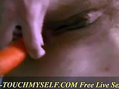 Masturbating and fucking herself with vegetables