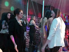 Sinfully lesbian cuties dancing and masturbating their slick beavers in public in a club