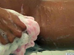 Watch one adorable raven haired Asian sweetie taking water procedures. She's all naked slowly rubs herself with soapy sponge and strokes her shaved pussy.