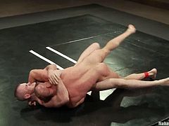 Chad Brock and Tober Brandt are having a struggle on tatami. They wrestle with each other furiously and then bang in missionary position and doggy style.